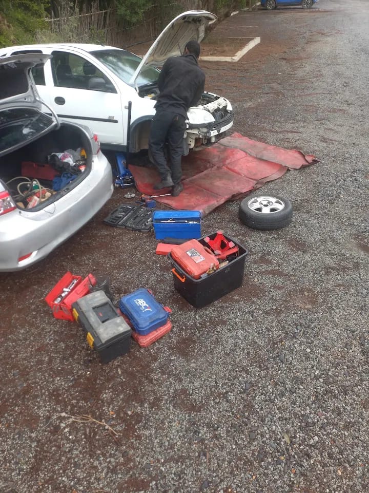 Mechanic carrying out a roadside repair